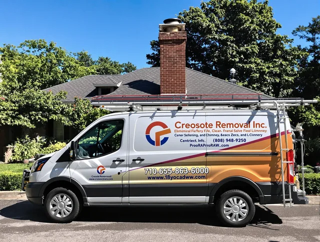 Westlake Chimney Sweep technician removing creosote safely in Westlake, OH